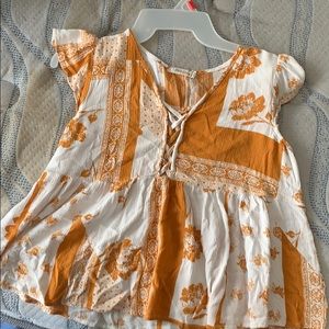 flowy & lace up at the top